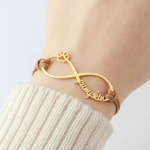 Silver infinity charm on brown leather — main product shot