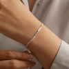 Mom-Waring-a-Bracelet-With-Kids-Name.webp Mom Bracelet With Kids Name