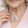 Personalized name necklace for grandma with grandchildren's names on linked silver heart pendants — meaningful grandmother gift by Keevola