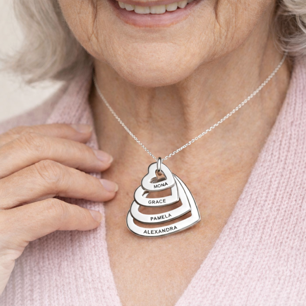 Personalized name necklace for grandma with grandchildren's names on linked silver heart pendants — meaningful grandmother gift by Keevola