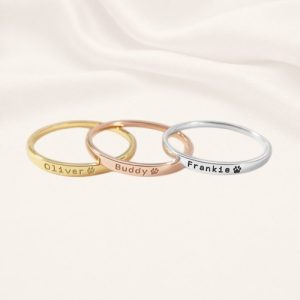 Personalized pet name ring with paw print engraving in gold — dog and cat lover keepsake by Keevola Personalized pet name ring with paw print engraving in gold — dog and cat lover keepsake by Keevola