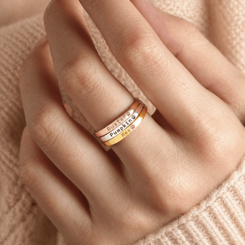 Woman wearing personalized pet name ring — dainty stacking ring Woman wearing personalized pet name ring — dainty stacking ring