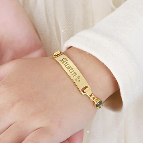 Baby wearing personalized name bracelet in gold — toddler jewelry gift for newborn or birthday