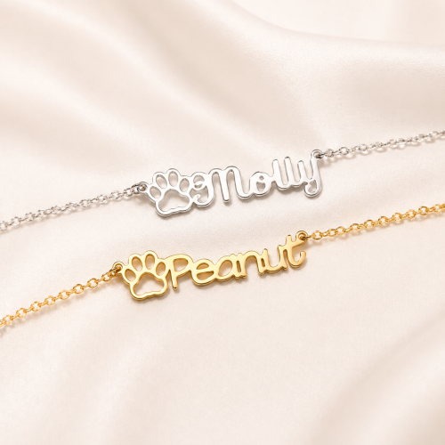 Gold and silver personalized pet name necklaces with paw