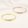 Engraved pet names on stackable rings — rose gold finish