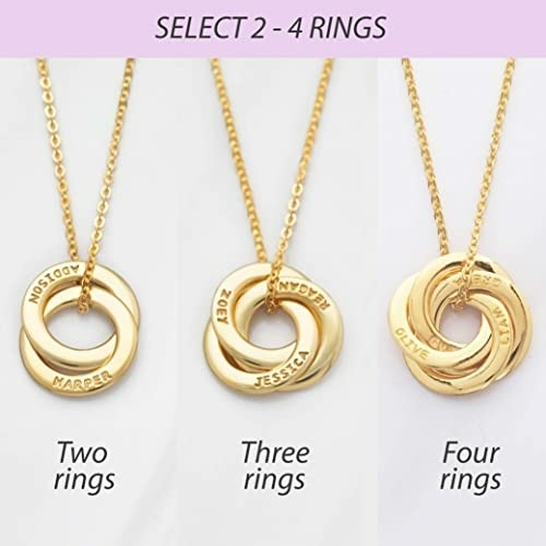 Close-up of interlocking name rings on personalized mom necklace — each ring engraved with a child's name