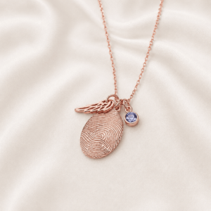 Fingerprint necklace with birthstone and wing charm in rose gold by Keevola