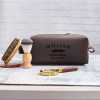 Personalized groomsmen dopp kit with engraved name on genuine leather