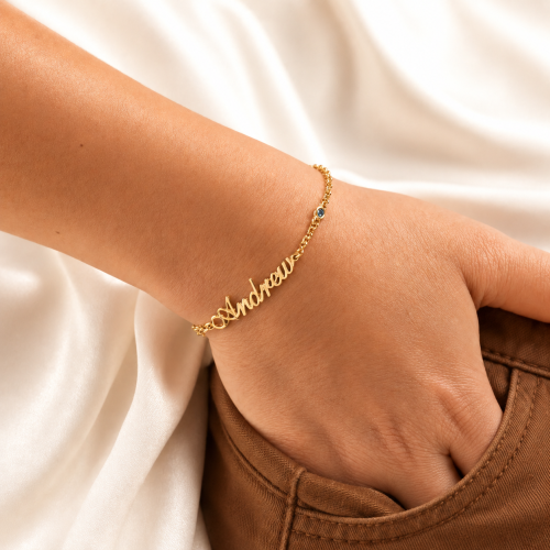 Woman wearing a Personalized Name Bracelet with birthstone