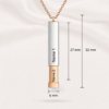 Secret message necklace with inner capsule slid open to reveal the hidden engraving