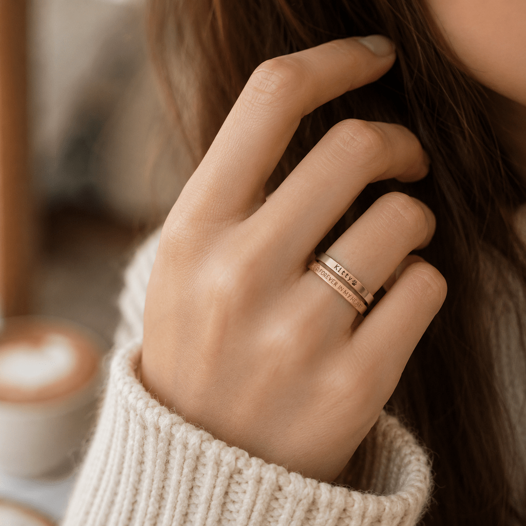 Woman wearing two different types of pet rings